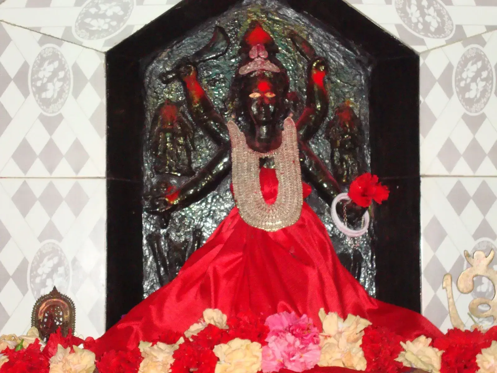 Stone steps winding up Chandranath Hill in mist